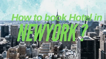 A higher angle picture of Newyork city with text written on it saying "How to book hotel in New York?".